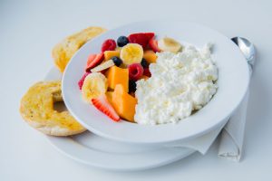 Fresh Fruit Salad Bowl with cottage cheese & a bagel